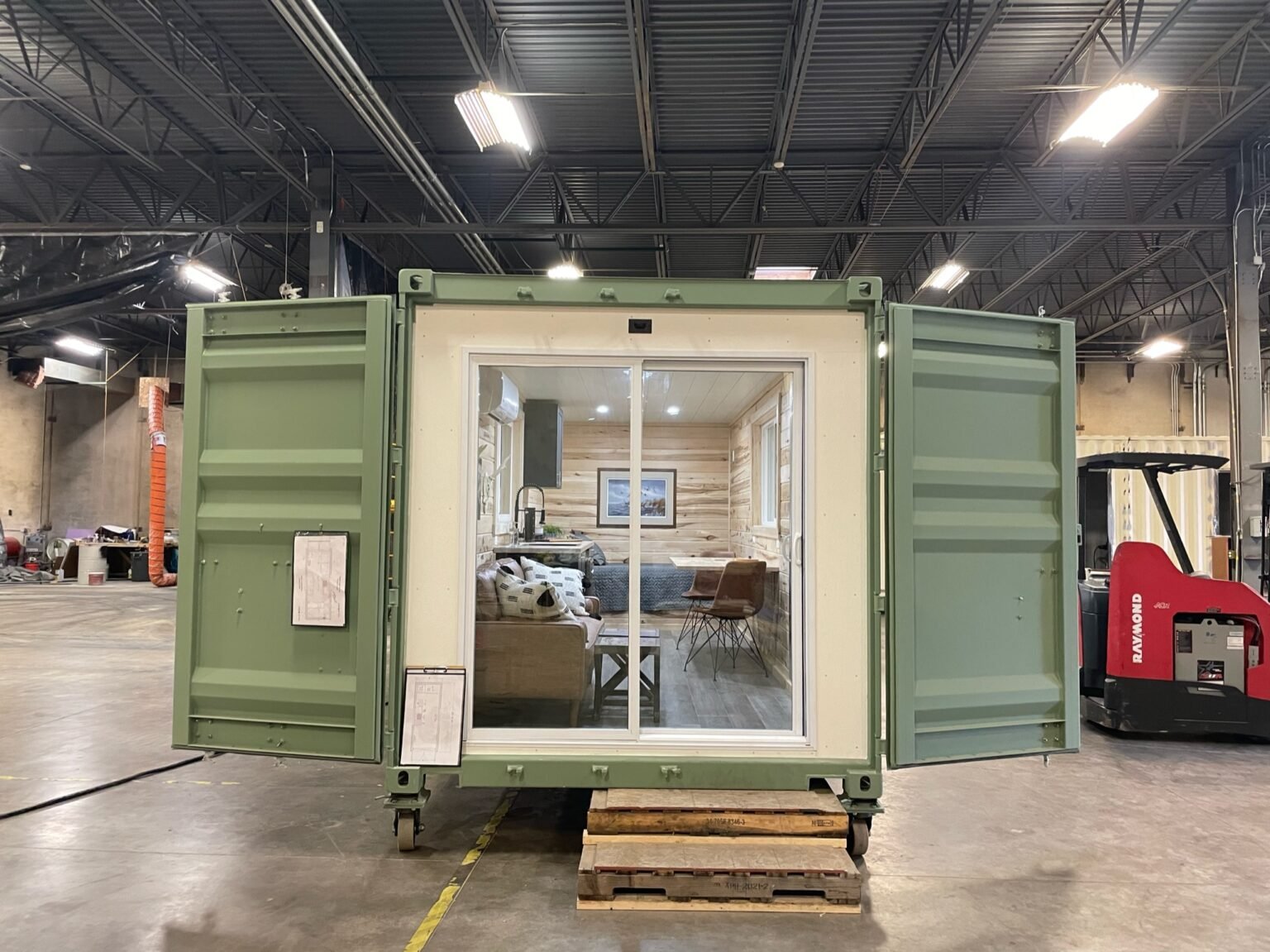 Photo-Jul-05-2023-8-25-51-AM-1536x1151-1.jpg 20FT Jack Hunting Container Cabin by Lease Lane Containers featuring an off-grid shipping container home with insulated interior